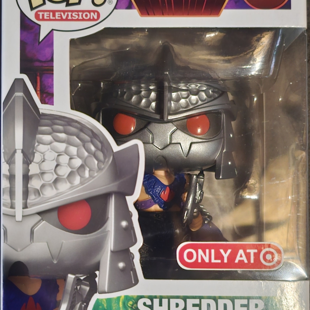 Funko Shredder Figure with Silver and Red Accents